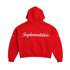 Red “Impl6ment” Zip Up